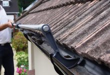 Clean Gutters on a Ladder